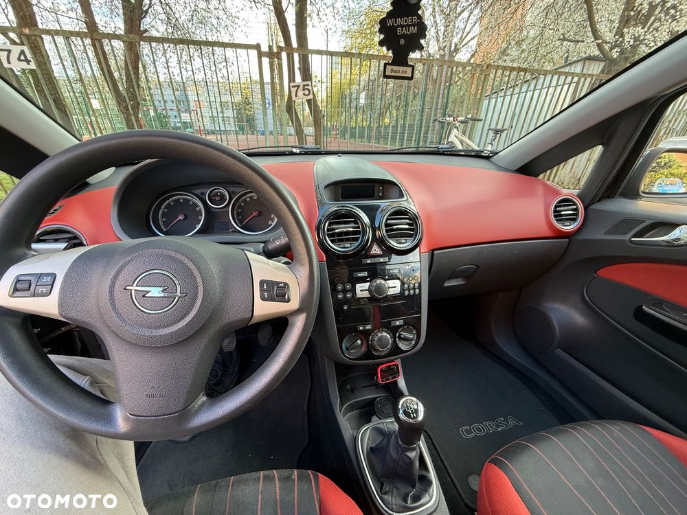 Opel Corsa 1.2 16V Enjoy - 11