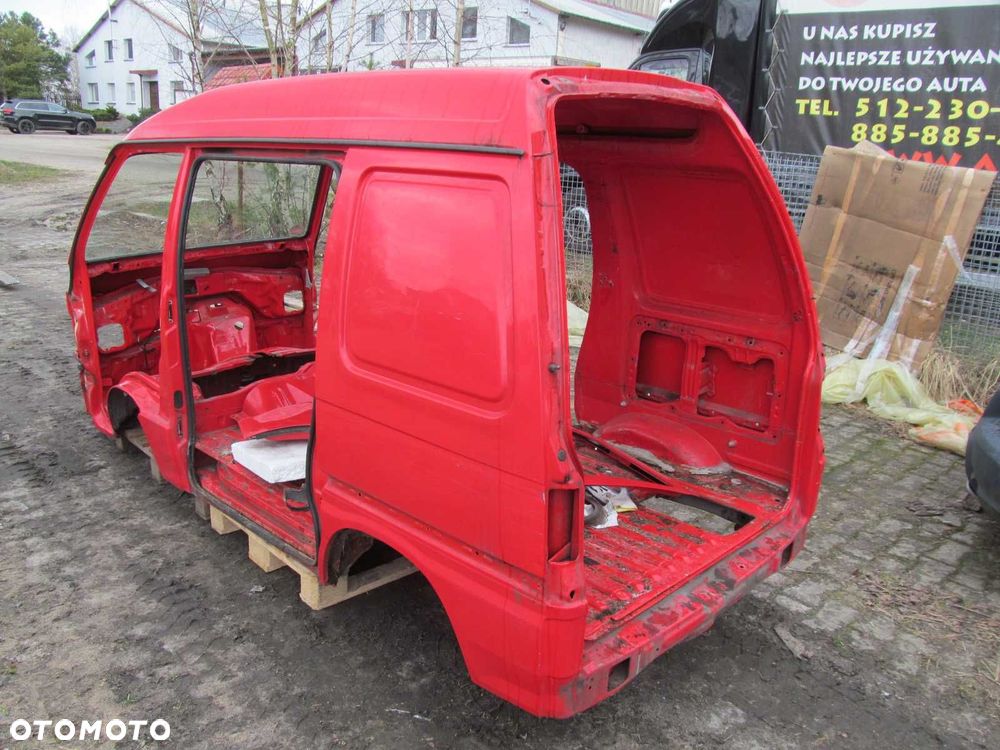 PIAGGIO PORTER HIJET 06-16 CWIARTKA BLOTNIK TYL LEWY - 1