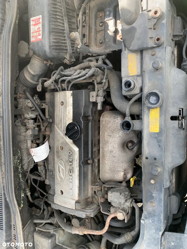 HYUNDAI GETZ 2003 1.3 *SAMOCHÓD NA CZĘŚCI* 1129 MASKA, LAMPA, DRZWI, LUSTERKO, ZDERZAK, GRILL, BŁOTNIK, KLAPA, BELKA, DESKA, FOTELE, KANAPA, ĆWIARTKA KIEROWNICA, TARCZE, ZACISKI, ZAWIESZENIE, KOMPLETNY PRZÓD, KOMPLETNY TYŁ, LICZNIK, ZEGARY, PRAWE LEWE PRZÓD TYŁ - 6