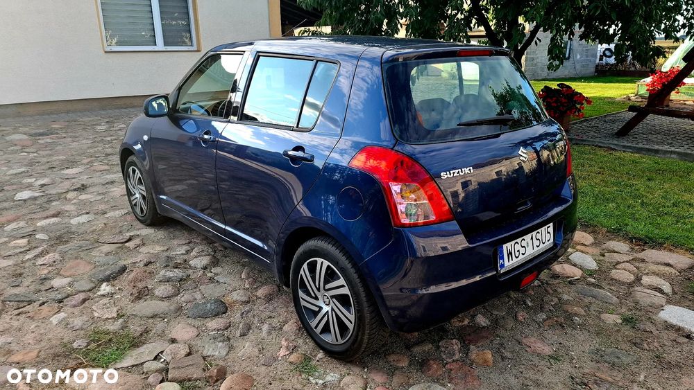 Suzuki Swift 1.3 Club - 8