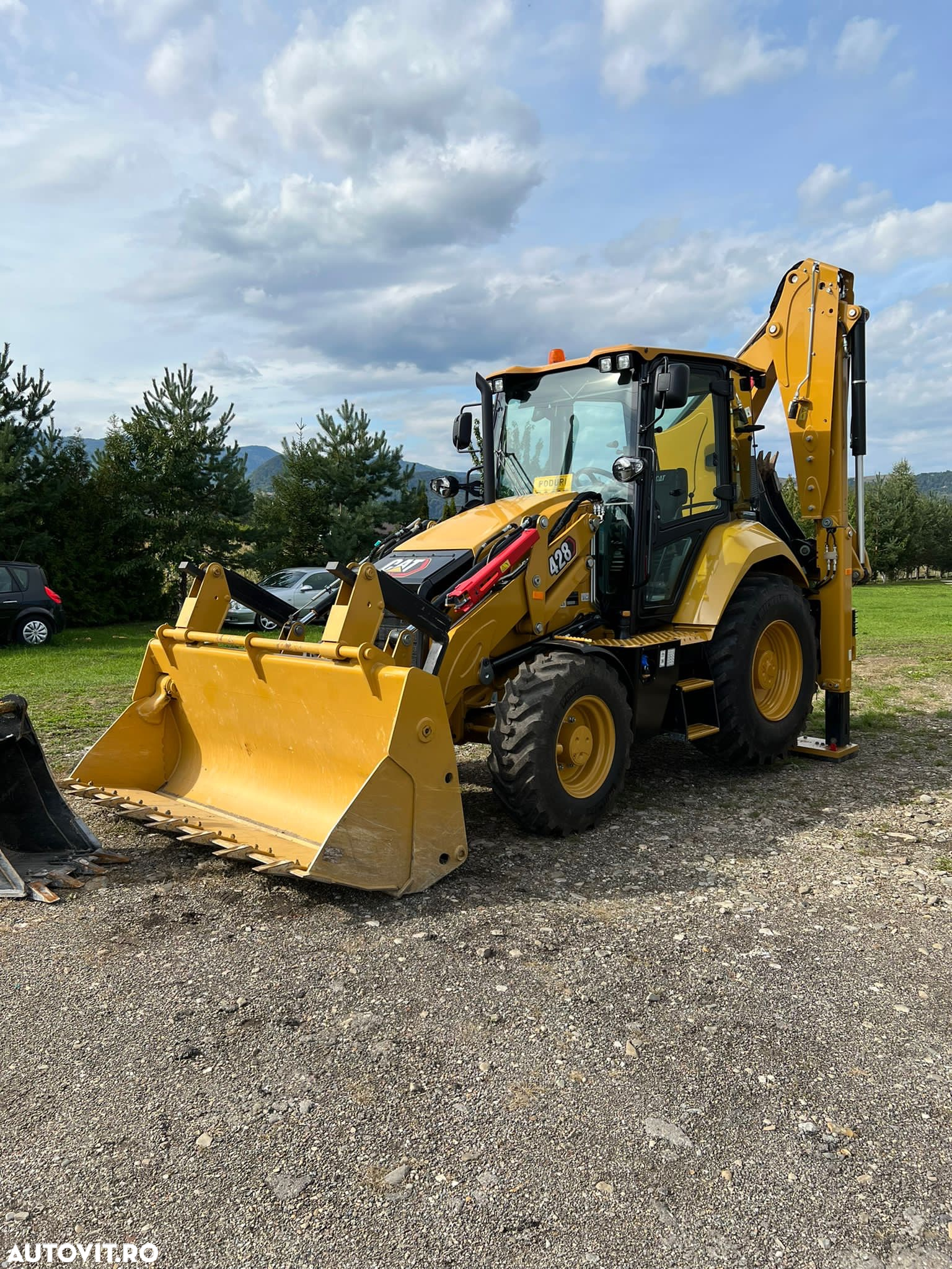 Caterpillar 428 - 5
