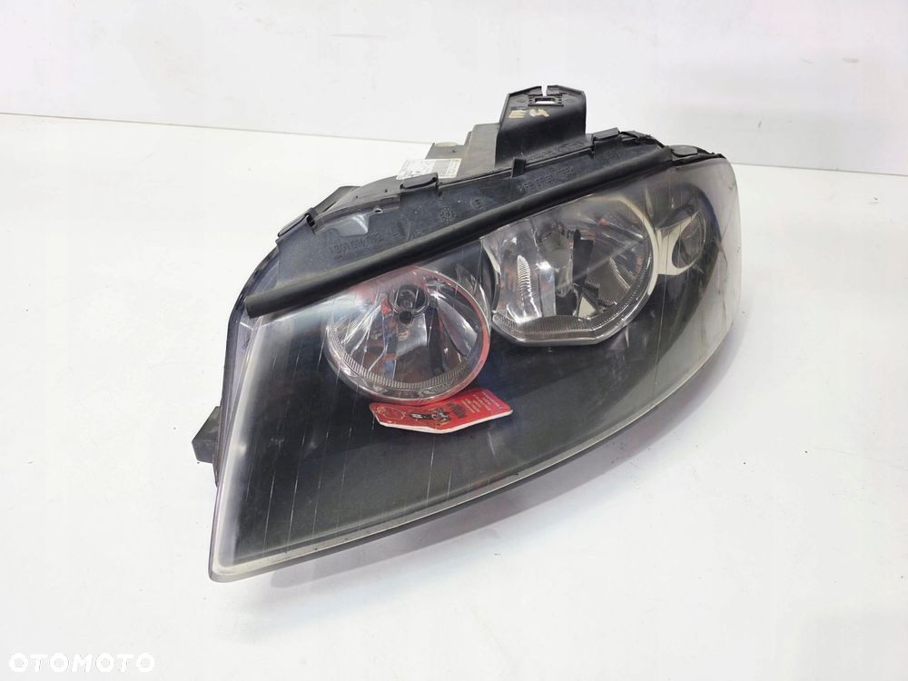 REFLEKTOR LAMPA LEWY PRZÓD EUROPA AUDI A3 8P DUŻY GRILL 8P0941003K 85/25 - 2