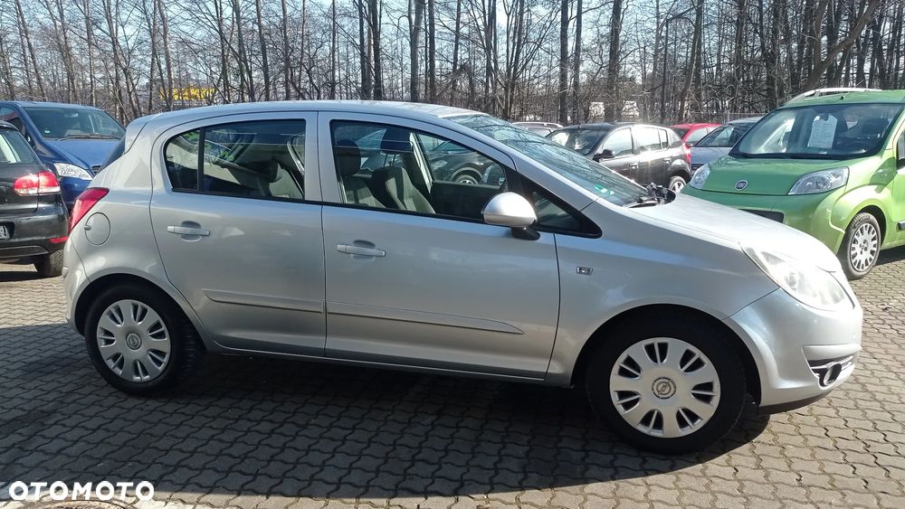 Opel Corsa 1.2 16V Enjoy - 23