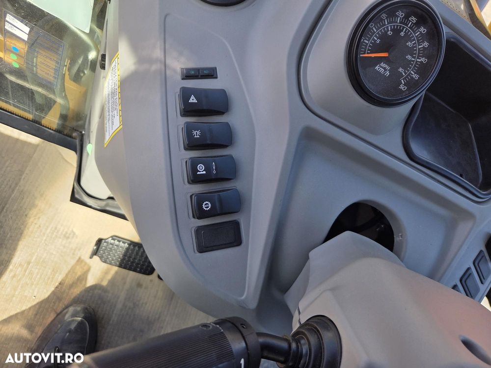 New Holland B110D NOU -nefolosit, FULL OPTION, Masa operatinoala 9,5 tone, motor 120CP euro6 cu Ad Blue, Certificat CE Atestat RAR, Cupa multifuncitonala 4x1, FURCI paleti, Brat excavare extensibil, anv MICHELIN, Aer cond, cutie POWERSHIFT, PROMOTIE 84900 EUR+T - 31