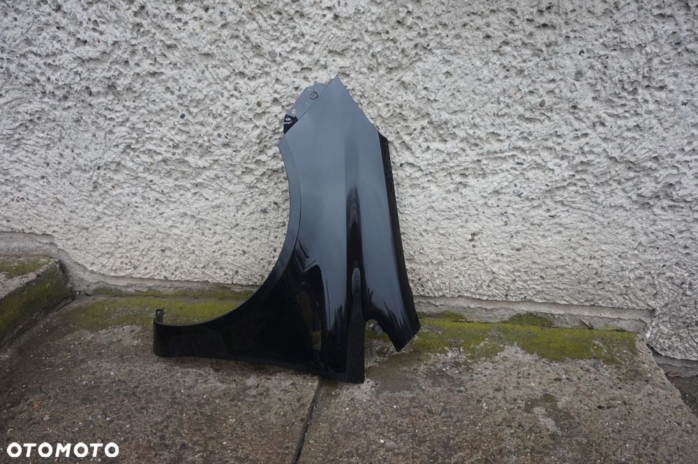 BŁOTNIK PRZEDNI LEWY OPEL CORSA D Z22C - 2