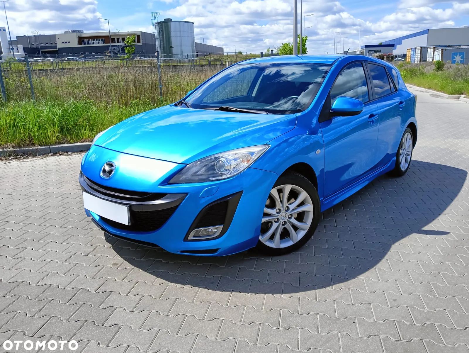 Mazda 3 2.0 MZR DISI Sports-Line - 1
