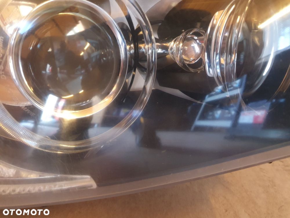 REFLEKTOR PRAWY BMW 3 E90 E91 XENON EUROPA - 2