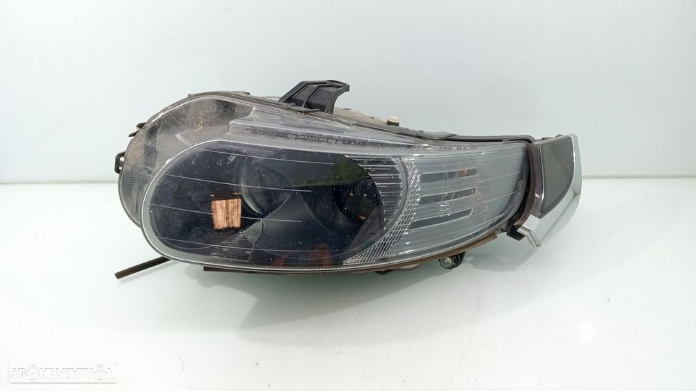 FAROL ESQUERDO SAAB 9-5 - 1