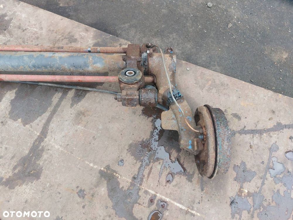BELKA OŚ ZAWIESZENIA TYŁ  PEUGEOT 106 I 91-96r BĘBNY - 2