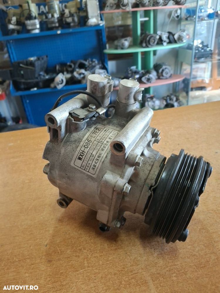 Compresor aer condiționat ÐR4 1.6 Benzina  84Kw - 1