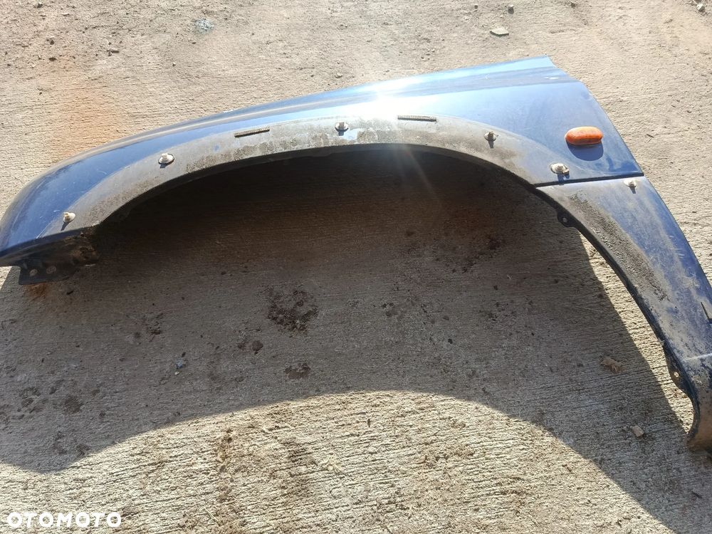 Błotnik lewy przód Z2U Suzuki grand vitara 1 - 2