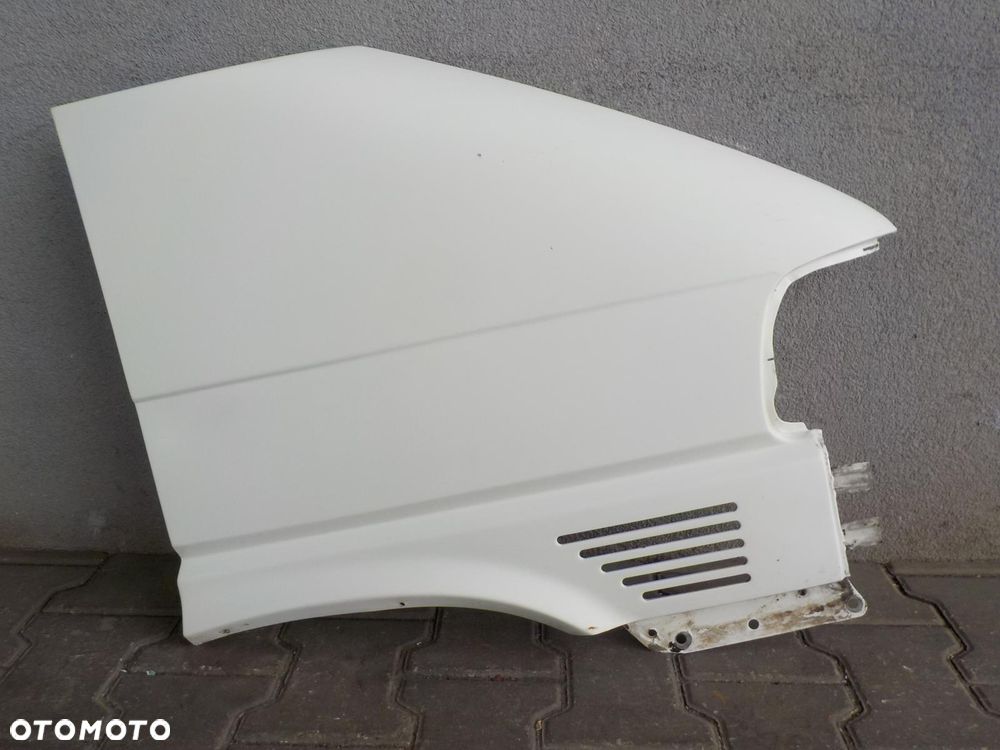 VW T4 CARAVELLE LIFT BŁOTNIK PRAWY PRZÓD - 1