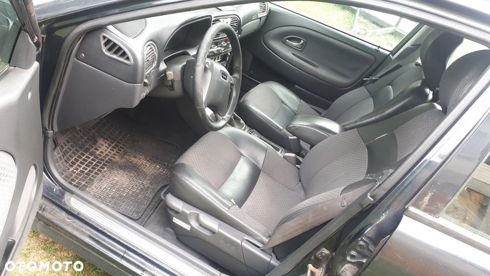 Volvo V40 1,9TD Wszystkie części Silnik skrzynia koła drzwi maska lampy szyby fotele - 13
