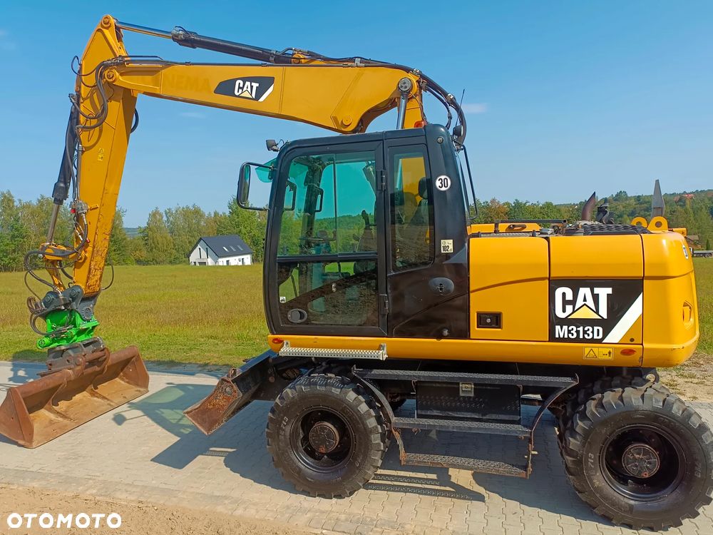 Caterpillar M313D - 12