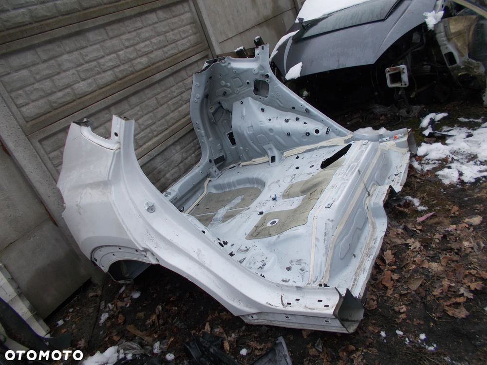 HYUNDAI TUCSON 3 LIFT  BŁOTNIK TYŁ - 2