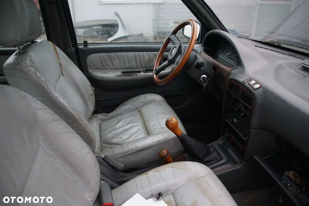 Auto na części - Kia Sportage I 2.0 DOHC 128 KM 4x4 1997R Silnik Skrzynia Drzwi Maska Klapa Drzwi Błotnik Zderzak Szyba Lusterko Klamka Lampa Deska Kokpit Sterownik Moduł Czujnik Licznik Panel - 15