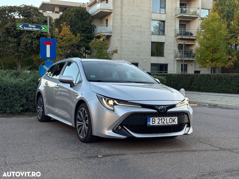 Toyota Corolla 1.8 HSD Exclusive - 26