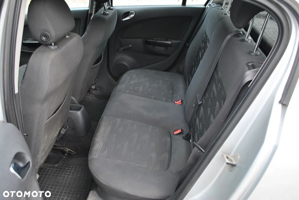 Opel Corsa 1.2 16V Enjoy - 11
