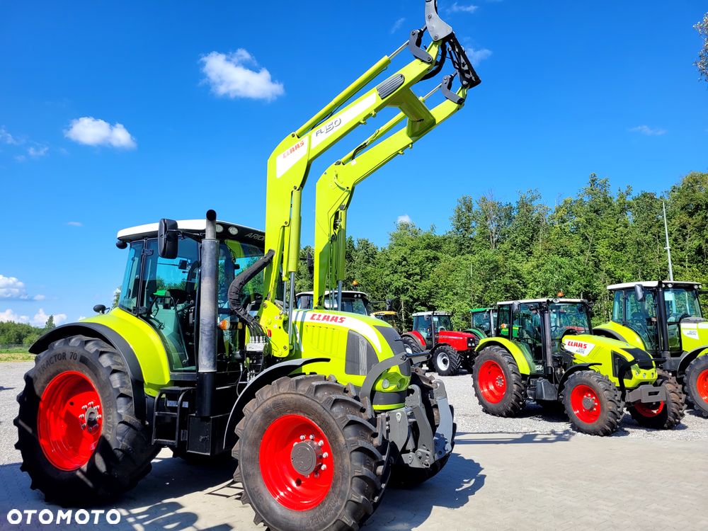 Claas ARION 640 CIS z ładowaczem FL 150 - 26