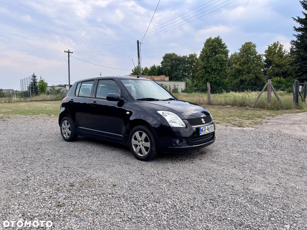 Suzuki Swift 1.3 Club - 8