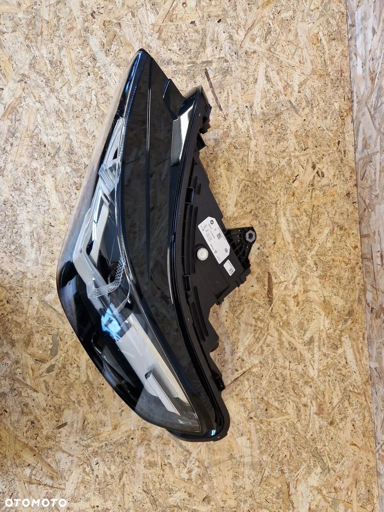 Lampa lewa Bmw U11 X1 - 6