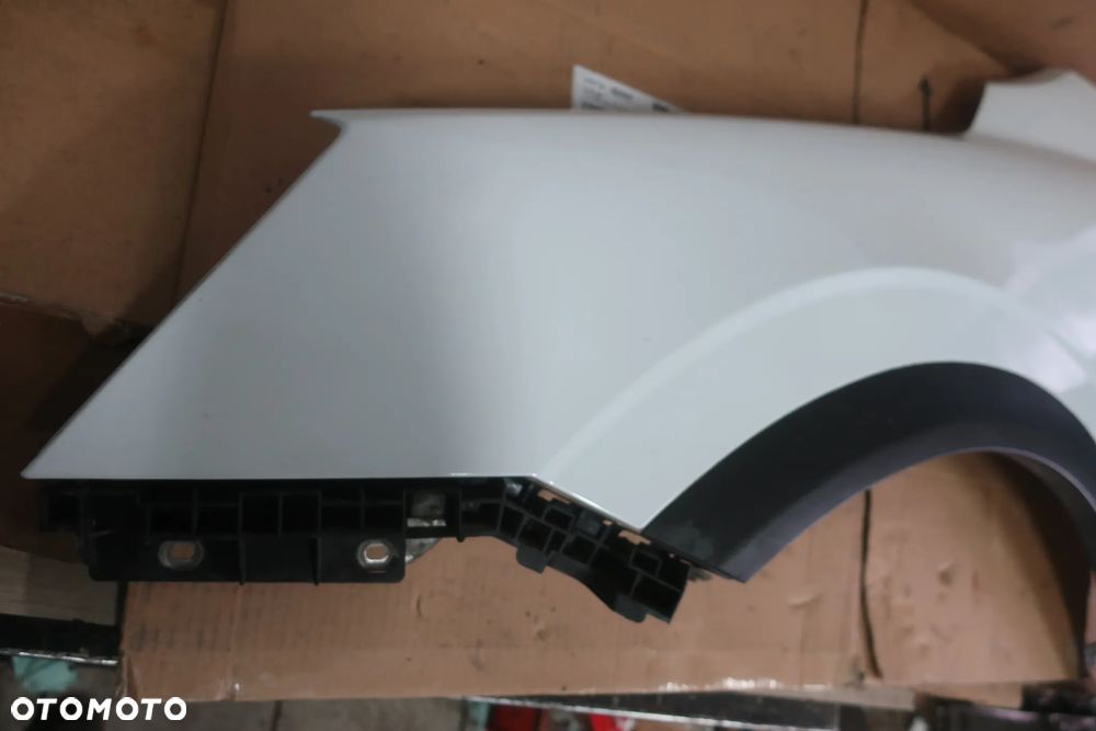 OPEL ANTARA BŁOTNIK LEWY PRZÓD GAZ 06-11R - 7