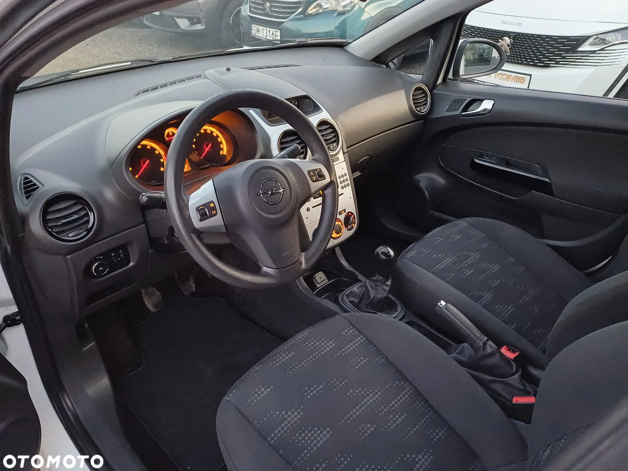 Opel Corsa 1.2 16V Enjoy - 11