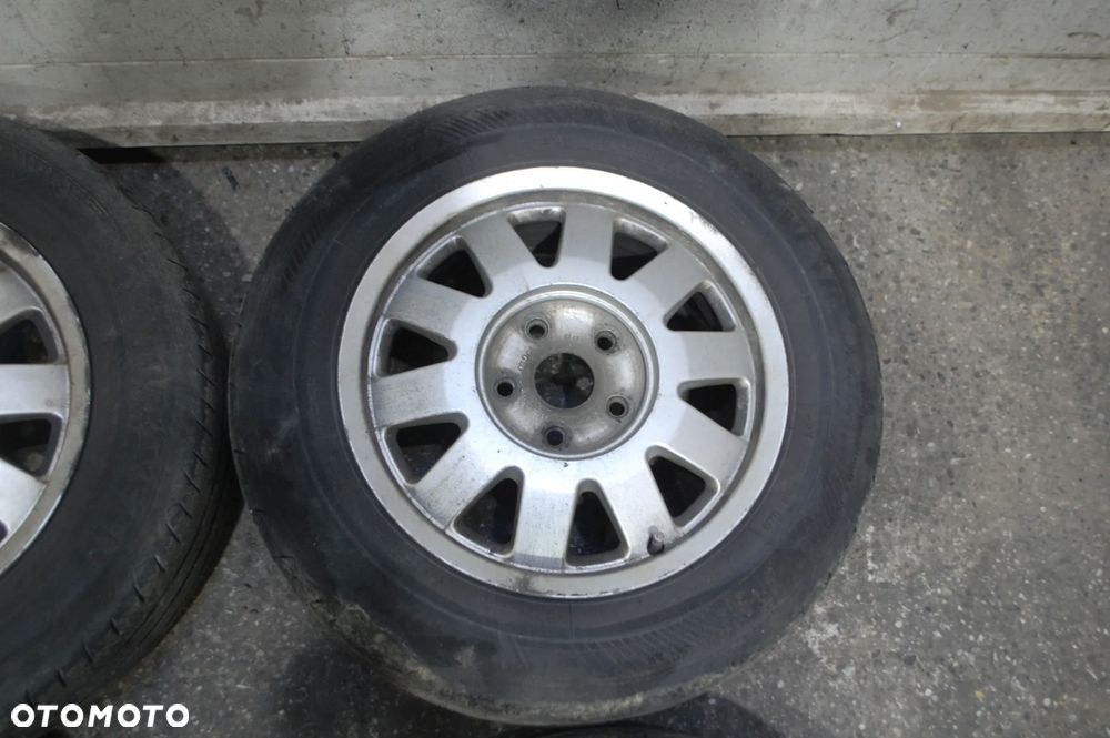 KOŁA FELGI ALUMINIOWE 8D0601025M 5X112 195/65R15 6J ET45 AUDI - 4