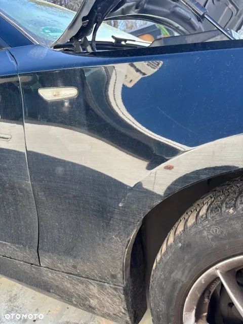 BŁOTNIK PRAWY PRZÓD BMW E87 668 - 2