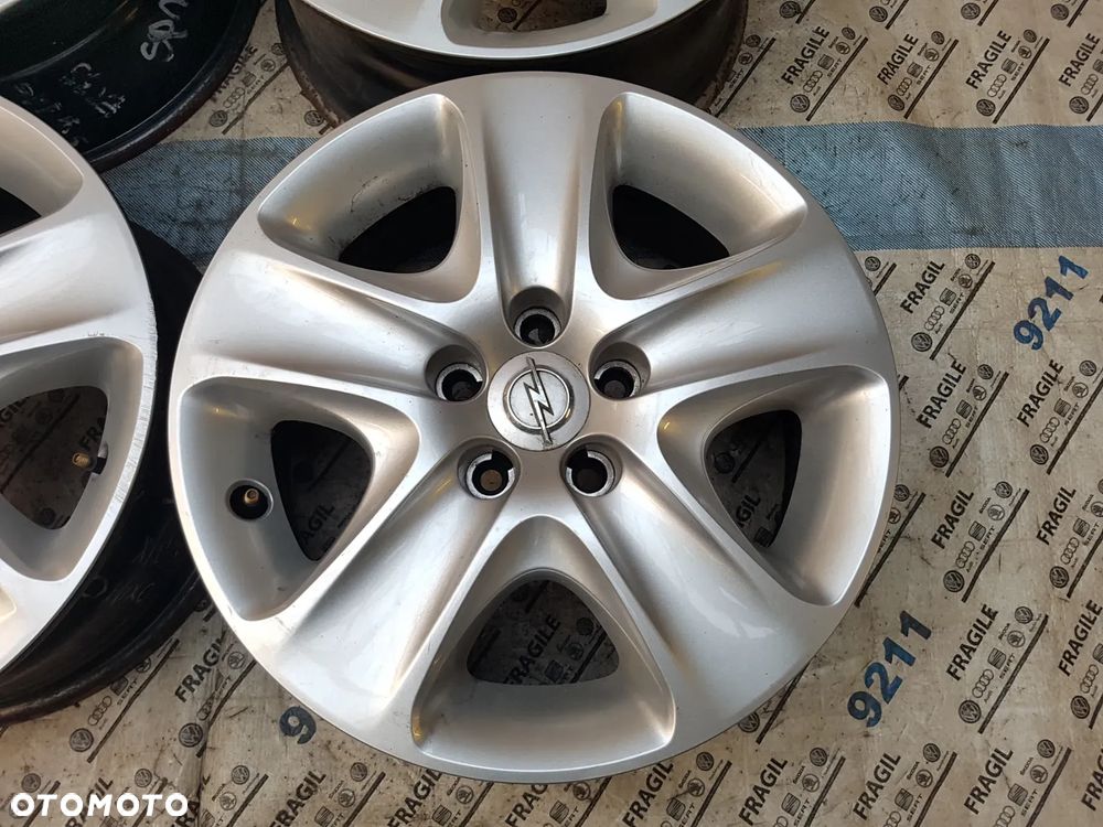 FELGI STALOWE+ KOŁPAKI  OPEL ASTRA H MERIVA B ZAFIRA B VECTRA C  5x110 6,5JX16 ET39 - 21