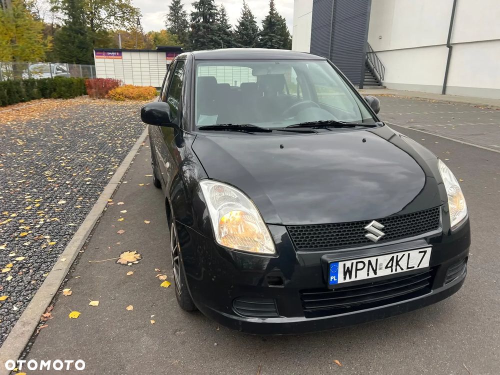 Suzuki Swift 1.3 Club - 4
