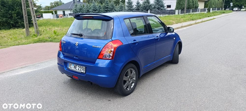 Suzuki Swift 1.3 Club - 8