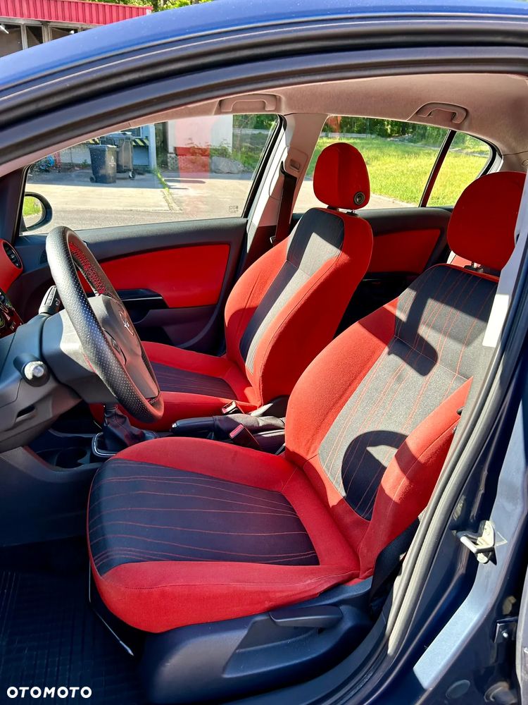 Opel Corsa 1.2 16V Enjoy - 13
