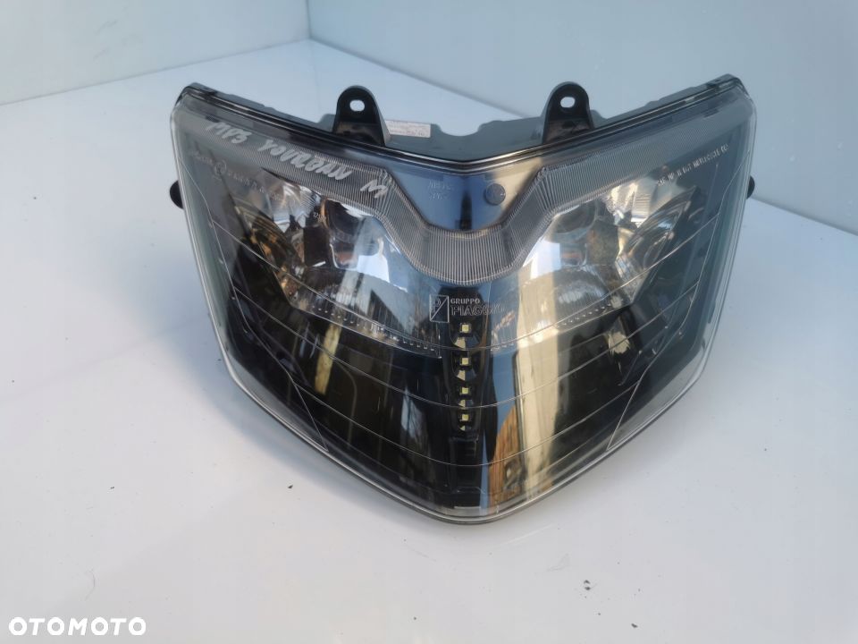Lampa reflektor Piaggio MP3 Yourban 125/300CM - 1