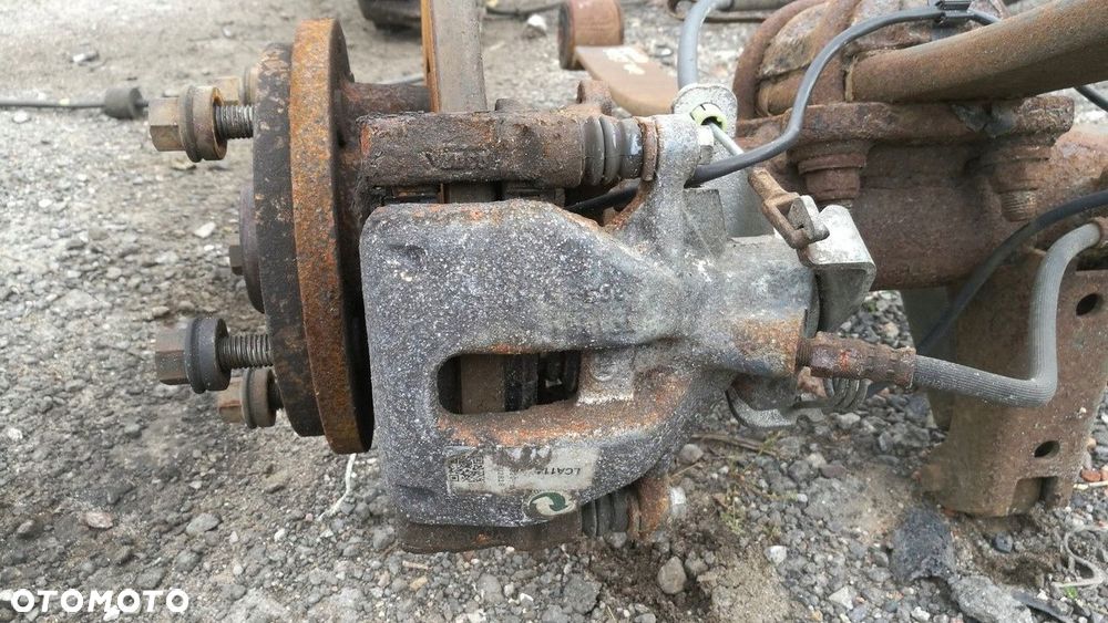 zacisk p tył ford transit 06-13 2.4 tdci tyl naped - 2