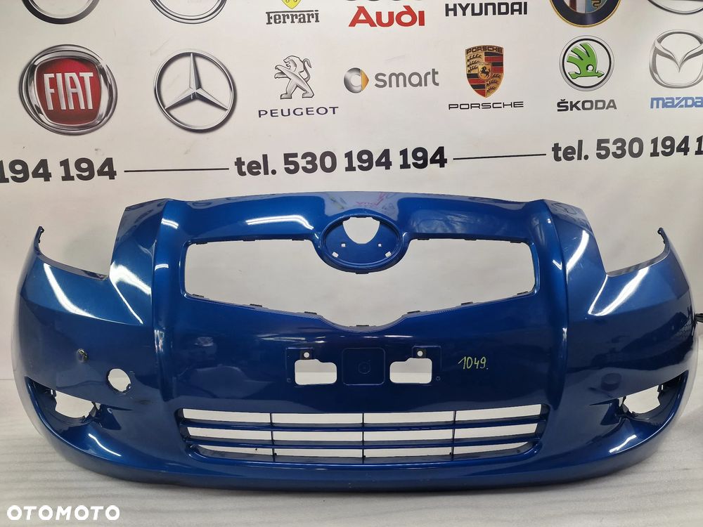 TOYOTA YARIS II 04- ZDERZAK PRZEDNI PRZÓD , NR AUKCJI NZ1049/2 - 1