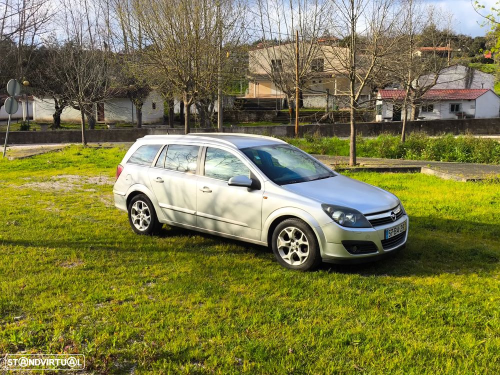 Opel Astra Caravan 1.9 CDTi Cosmo - 4