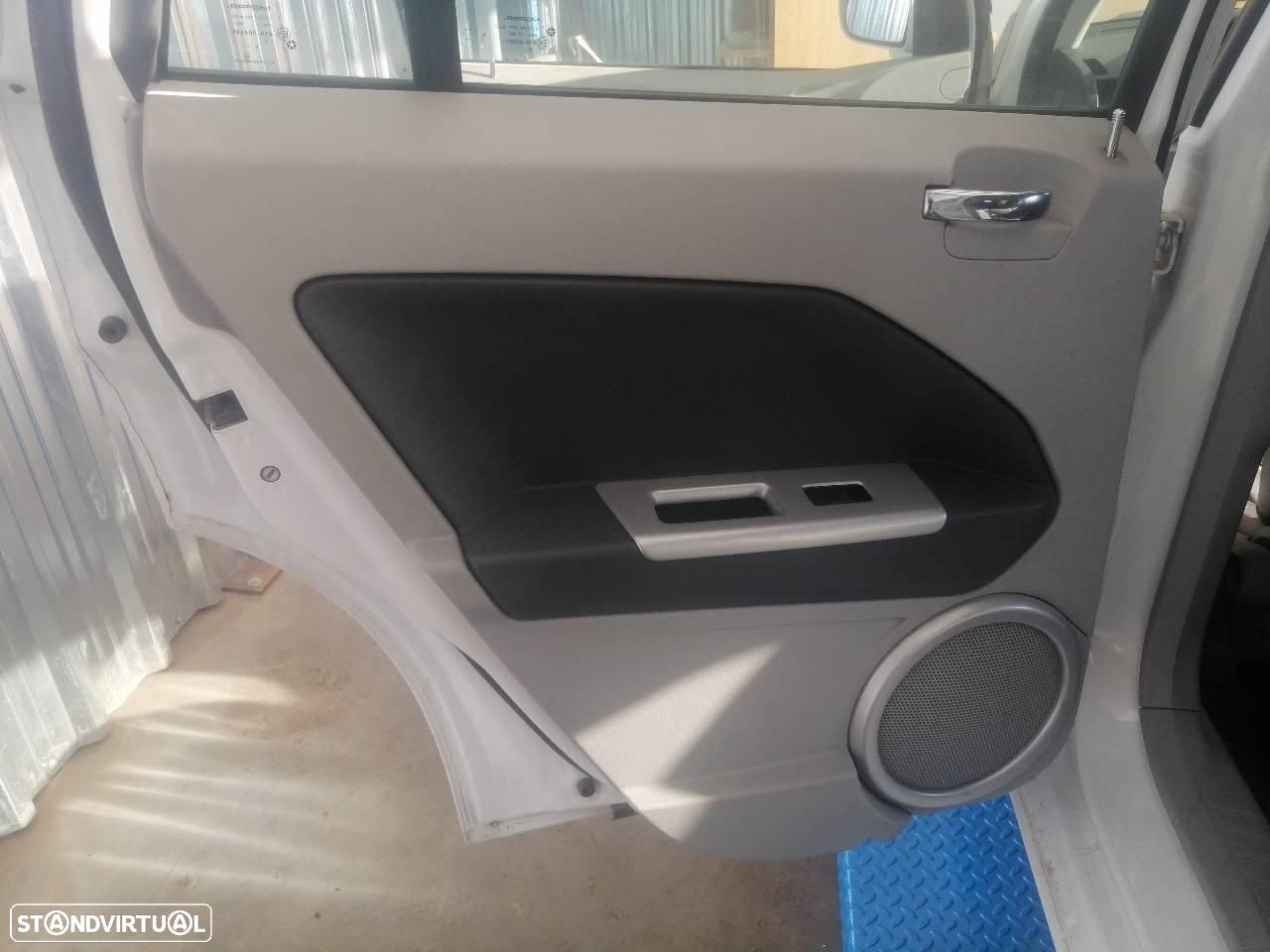 FORRA DA PORTA TRASEIRA ESQUERDA DODGE CALIBER PM - 1