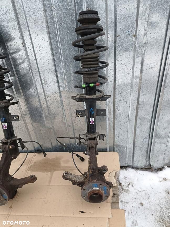 dacia sandero stepway iii 21r- 1.0 tce amortyzator zwrotnica prawy przód - 1