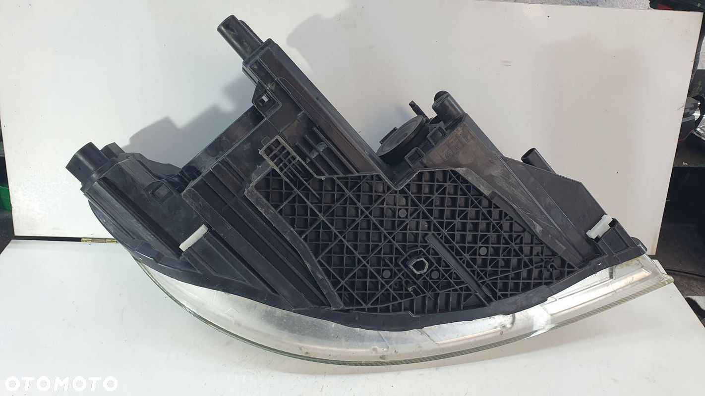 Skoda Octavia 2 II 1Z Lift 08-12 lewa lampa przednia przód reflektor € - 11
