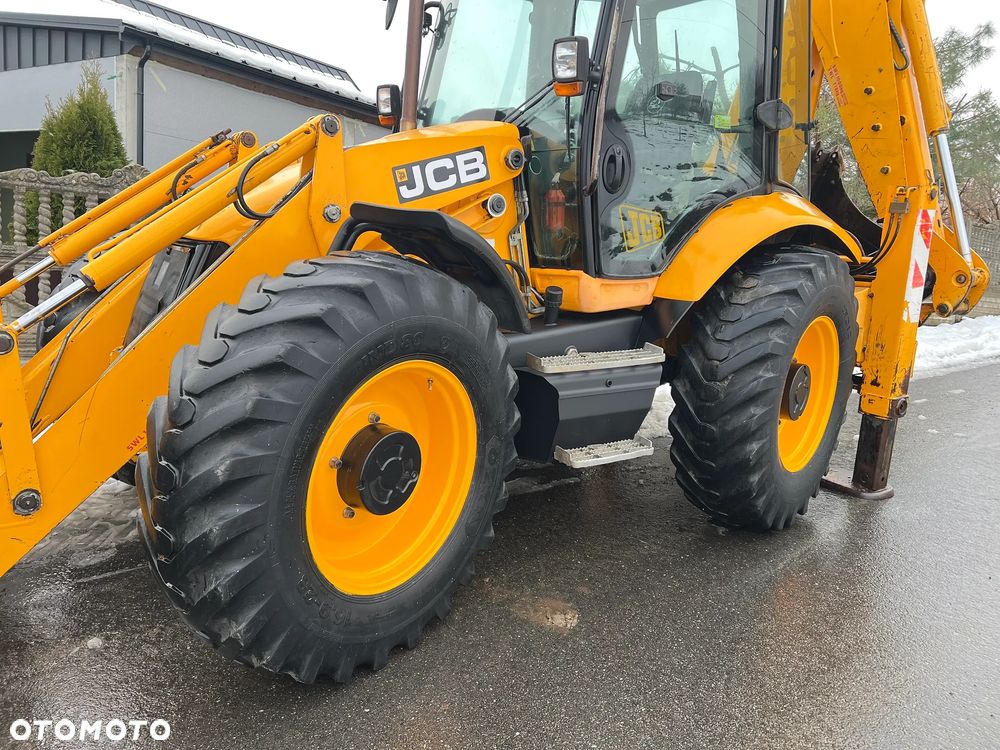 JCB 4CX * Koparko Ładowarka JCB 4 CX * Powershift * Pełna Opcja * Widły * Szczęka * Teleskop * STAN BARDZO DOBRY * - 31