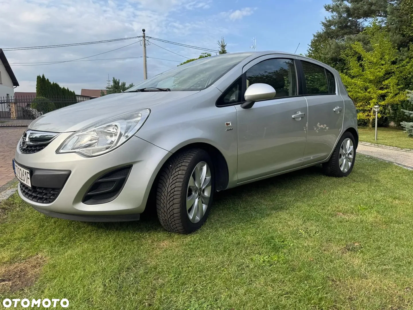 Opel Corsa 1.4 16V Active - 4