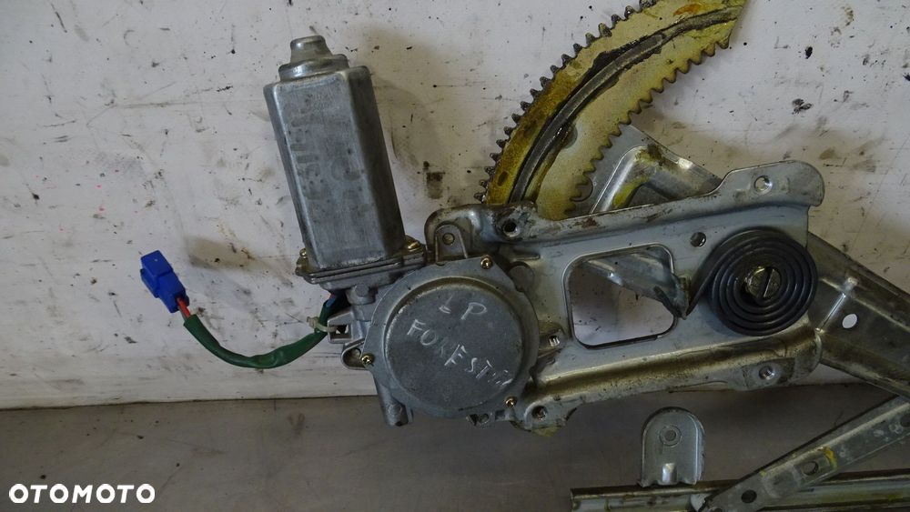 PODNOŚNIK SZYB LEWY PRZÓD SUBARU FORESTER I 2.0 - 2