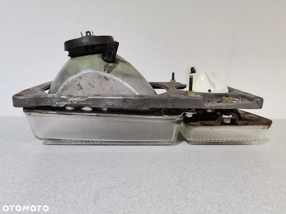 Lampa Reflektor LEWY VOLKSWAGEN PASSAT B2 80-88 HELLA Oryginał - 10