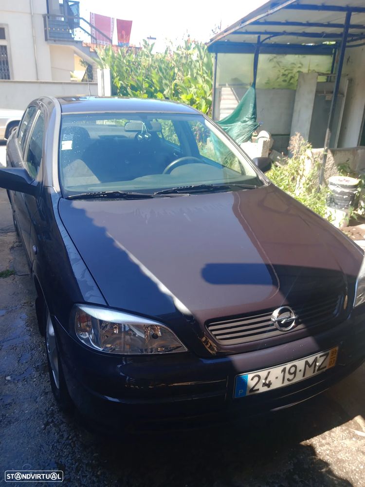 Opel Astra 1.4i 16V — fotografia 12