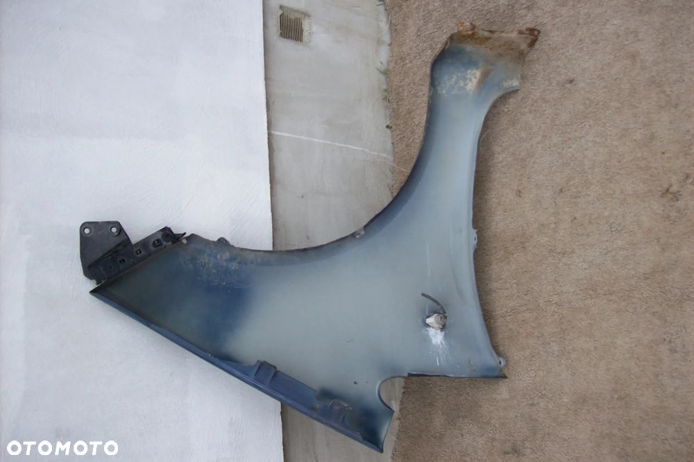 BŁOTNIK PRZEDNI LEWY MITSUBISHI COLT VI ROK 04/08 - 5