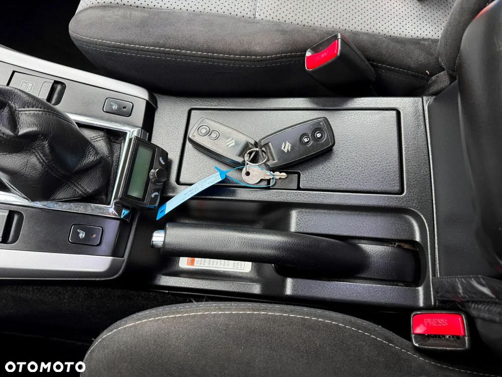 Suzuki Grand Vitara 2.0 Comfort + - 12