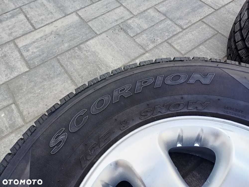 FELGI Z OPONAMI KOŁA ALUMINIOWE OPEL FRONTERA B R16 6X139.7 7Jx15CH-38 106.1 mm NR25 - 7