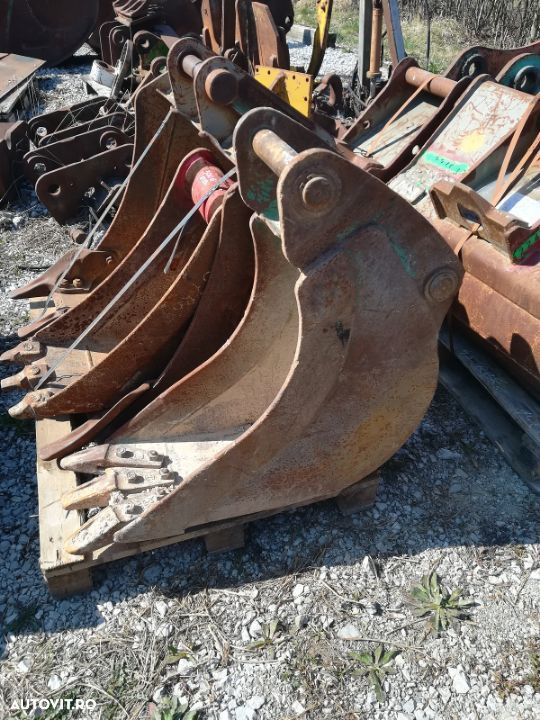 Cupa buldoexcavator Caterpillar - 1