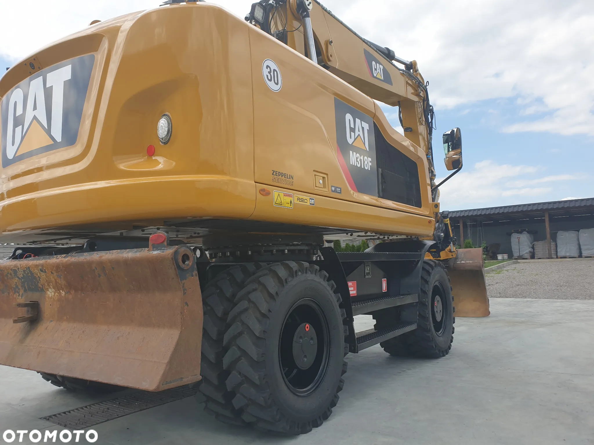 Caterpillar M 318 F ROTOTILT SPROWADZONY ŁADNY STAN - 34
